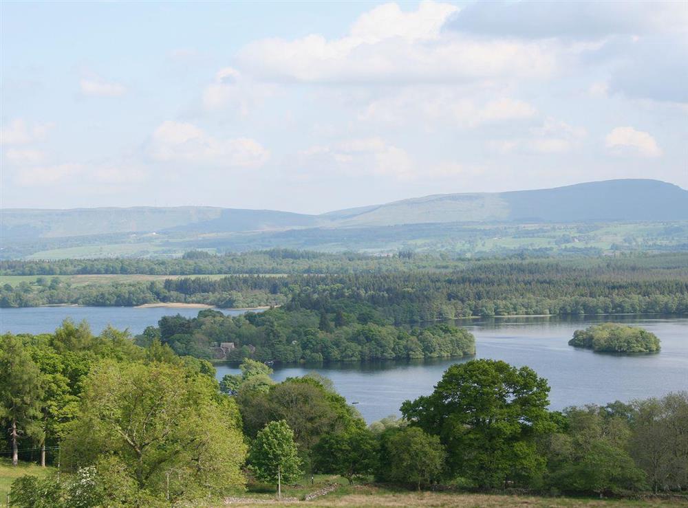 Far reaching view over the Lake of Mentieth towards the distant hills at Gamekeepers Lodge in Port of Menteith, Stirlingshire