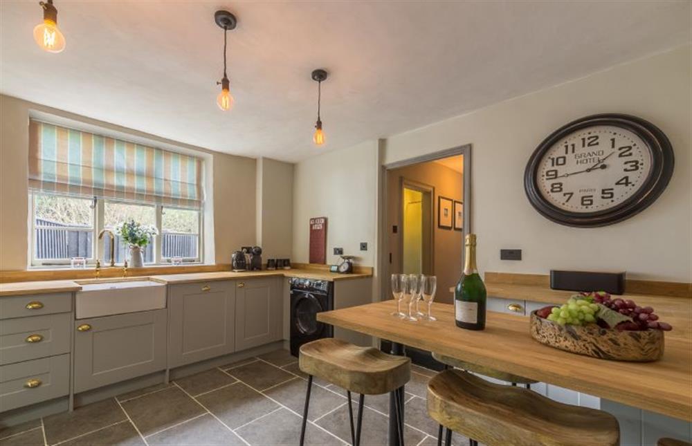 Ground floor:  Kitchen with breakfast bar with seating for four  at Gamekeepers Lodge, South Raynham near Fakenham