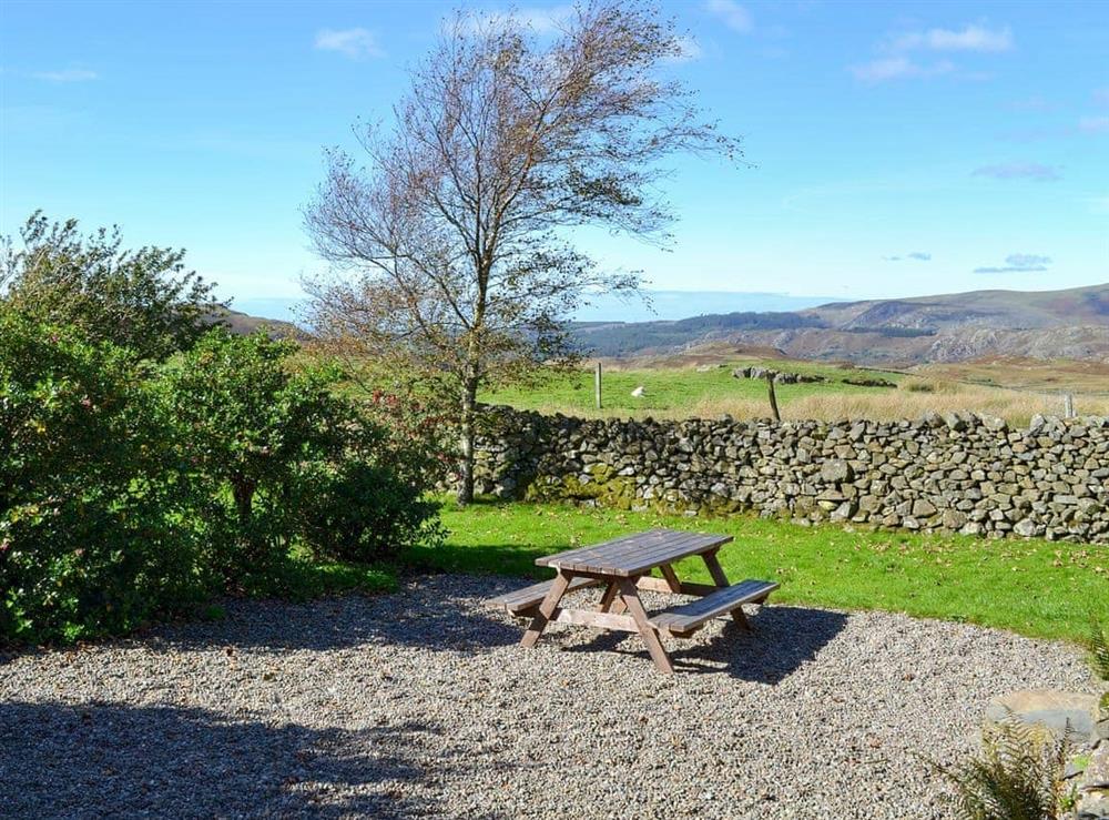 Sitting-out-area with wonderful views of the surrounding area at Ganny House in Birkerthwaite, Birkermoor, Eskdale, Cumbria., Great Britain