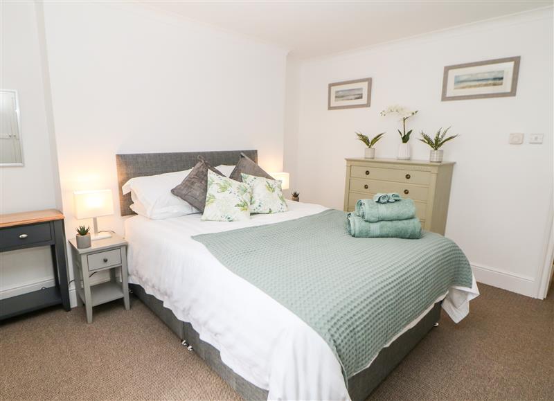 One of the bedrooms at Garden Apartment, Buxton