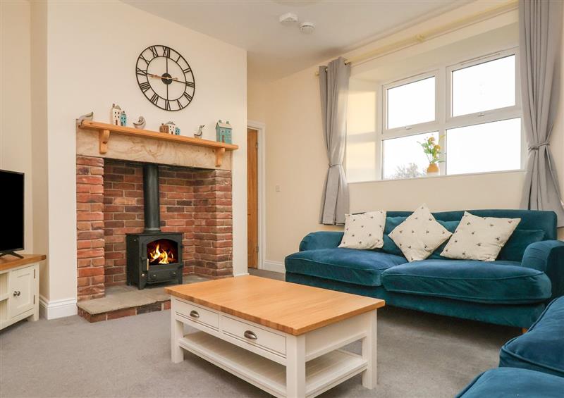 Relax in the living area at Garden Cottage, Alnmouth