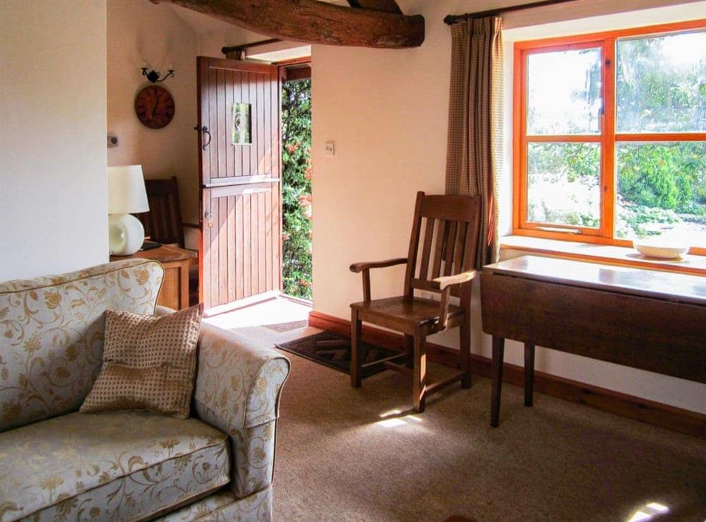 Living room/dining room at Garden Cottage in Corse Lawn, near Tewkesbury, Gloucestershire