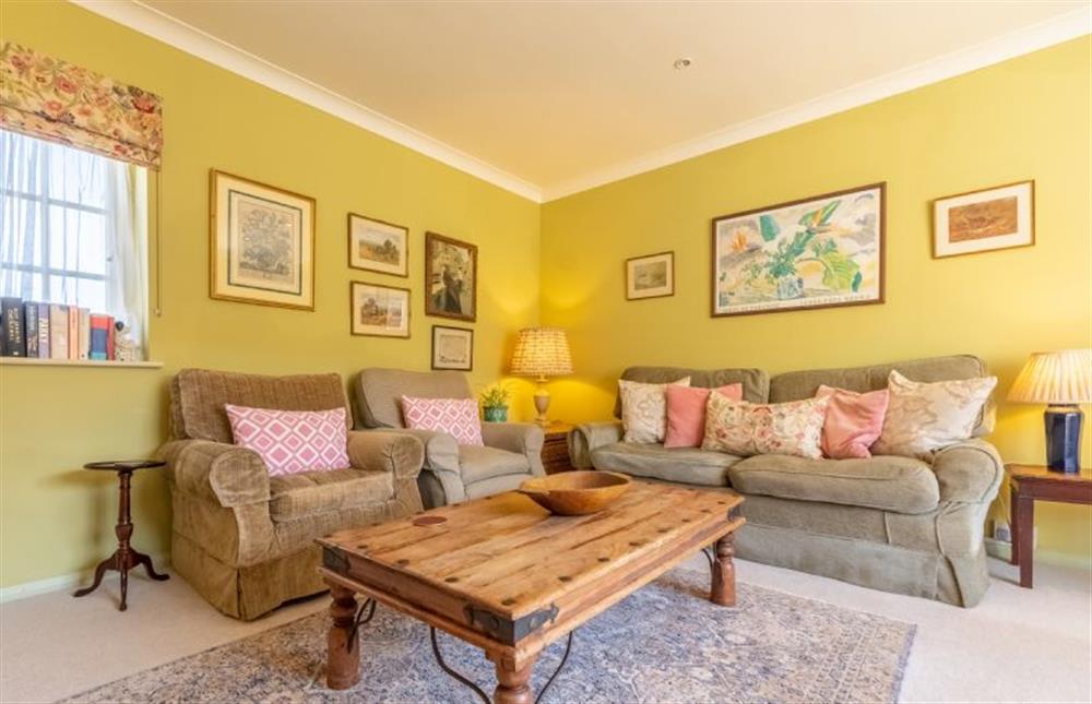 Garden Cottage:  Sitting room with plenty of comfortable seating  at Garden Cottage, East Rudham near Kings Lynn