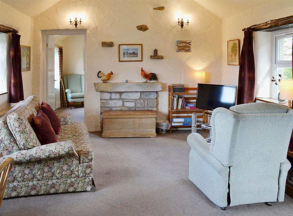 Spacious living/dining room with high ceiling at Garden Cottage in Edlingham, near Alnwick, Northumberland