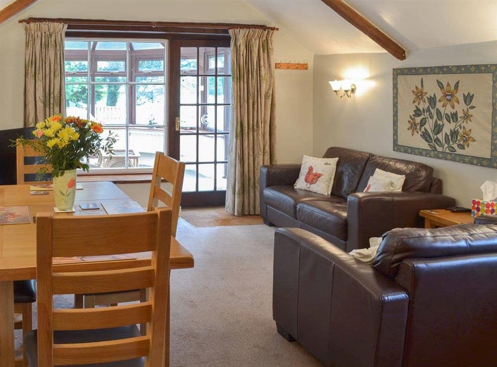 Spacious living/ dining room at Garden Cottage in Harbertonford, Totnes, Devon
