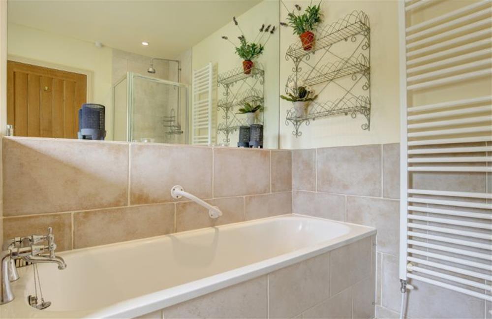 Ground floor:  Bathroom with heated towel rail at Garden Cottage, Manor House Farm, Wellingham near Kings Lynn