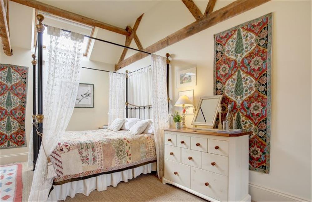 Ground floor:  Master bedroom with velux window and chest of drawers at Garden Cottage, Manor House Farm, Wellingham near Kings Lynn