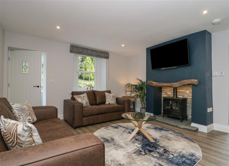 Relax in the living area at Garden Cottage No 1, Keswick