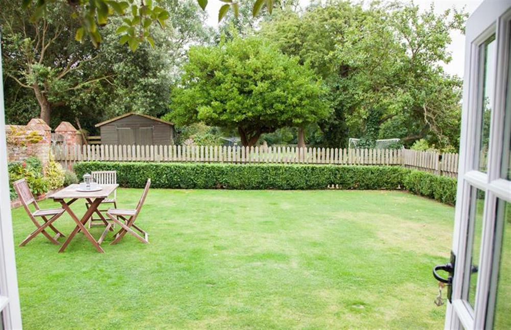 The garden is enclosed  at Garden Cottage, Ringstead near Hunstanton