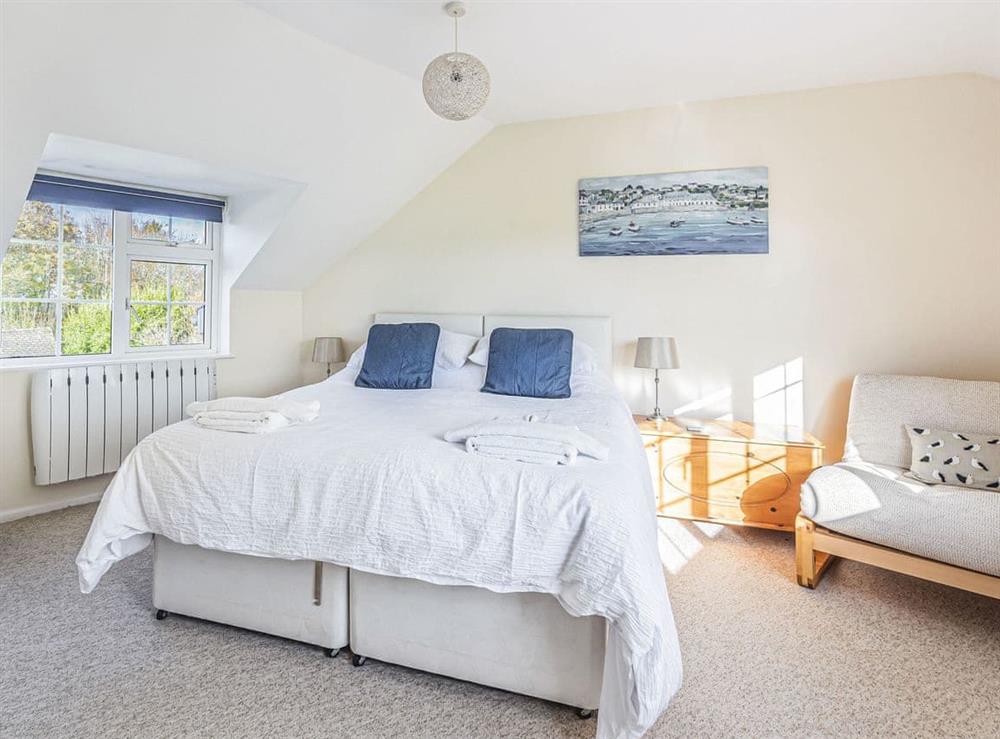 Spacious double bedroom with space for a further bed or cot at Garden Cottage in Roseland Peninsula, Cornwall