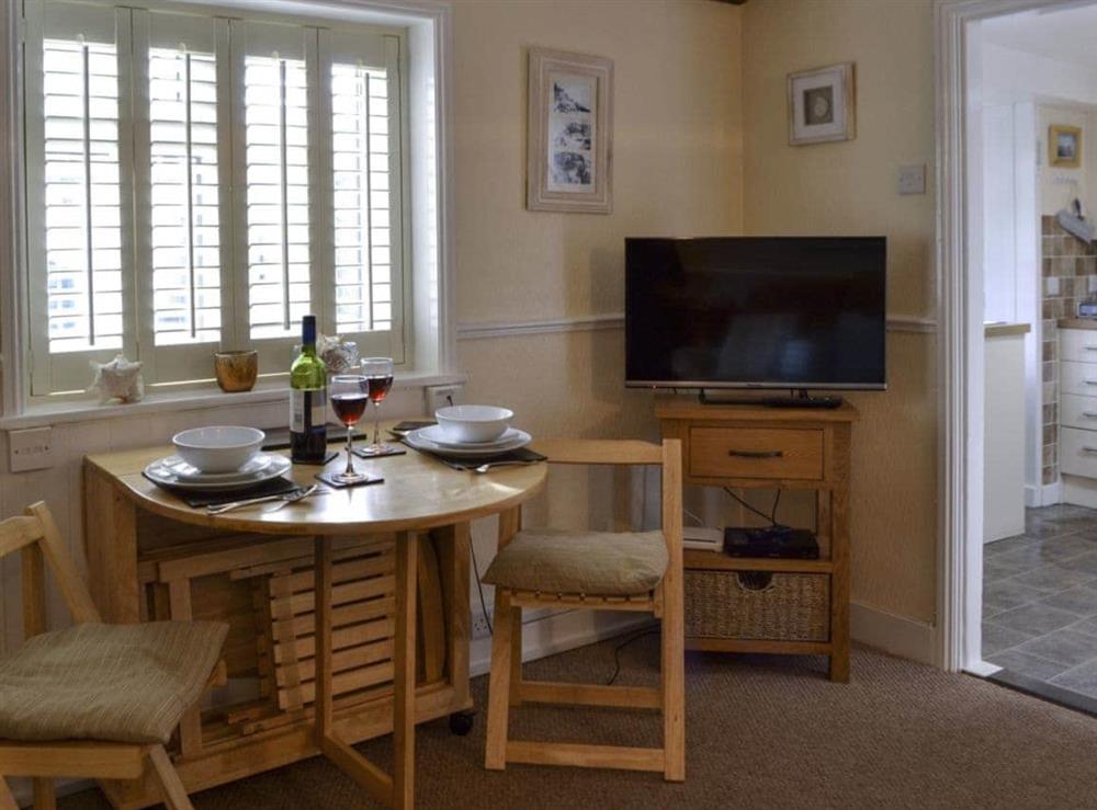 Dining area at Garden Cottage in Rottingdean, near Brighton, East Sussex