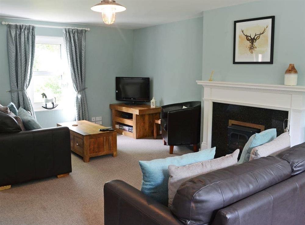 Beautifully presented living area at Garden Cottage in Tain, Highlands, Ross-Shire