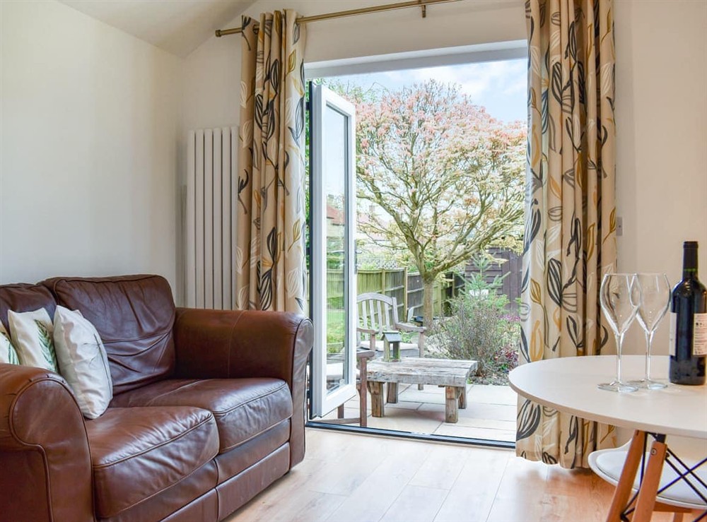 Open plan living space at Garden Cottage in Thornton Le Dale, near Pickering, North Yorkshire