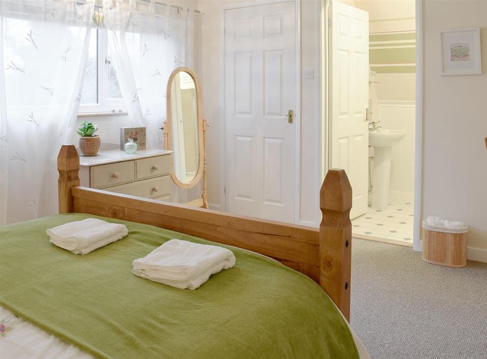 Spacious double bedroom with en-suite at Garden Cottage in Wangford, near Southwold, Suffolk, England