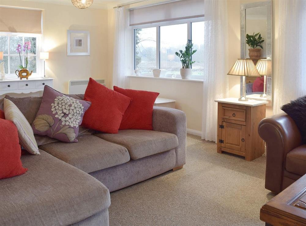 Spacious living room at Garden Cottage in Wangford, near Southwold, Suffolk, England