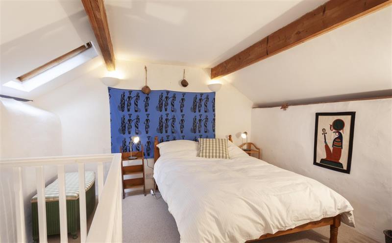 A bedroom in Garden Cottage at Garden Cottage, Wiveliscombe