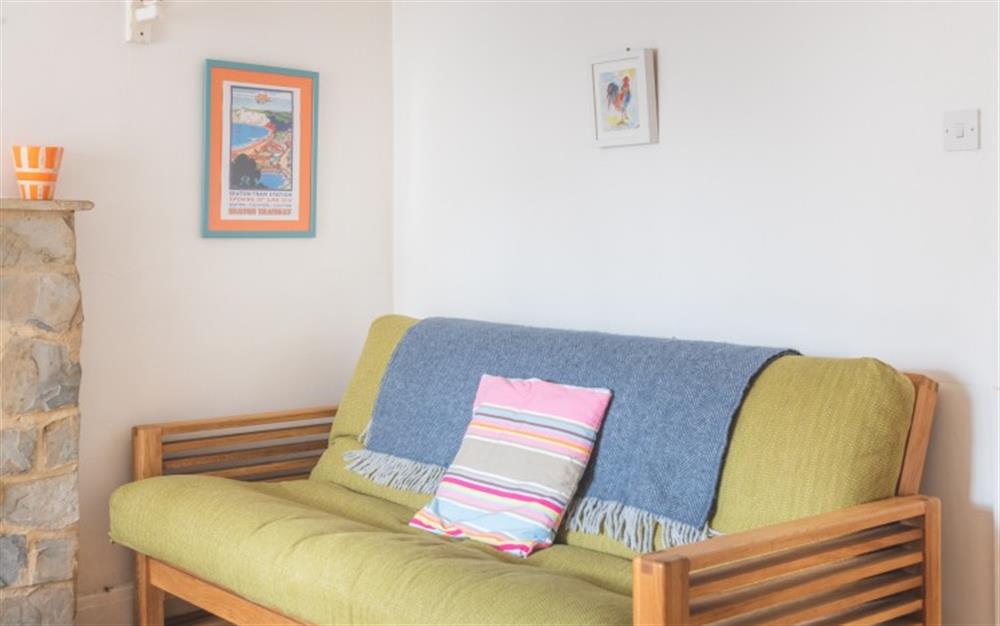 Relax in the lounge at Garden Flat in Lyme Regis