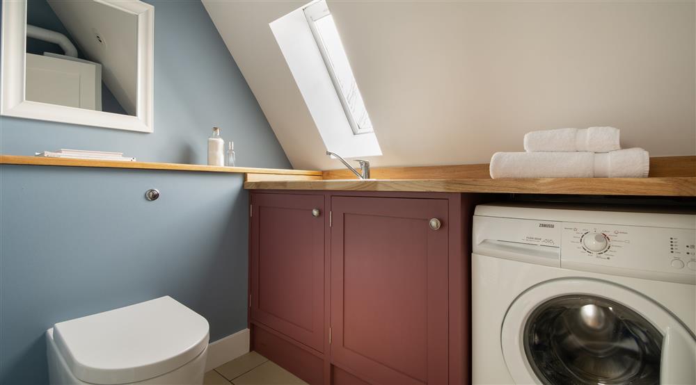 The utility room at Garden Gate Apartment in Durham, County Durham