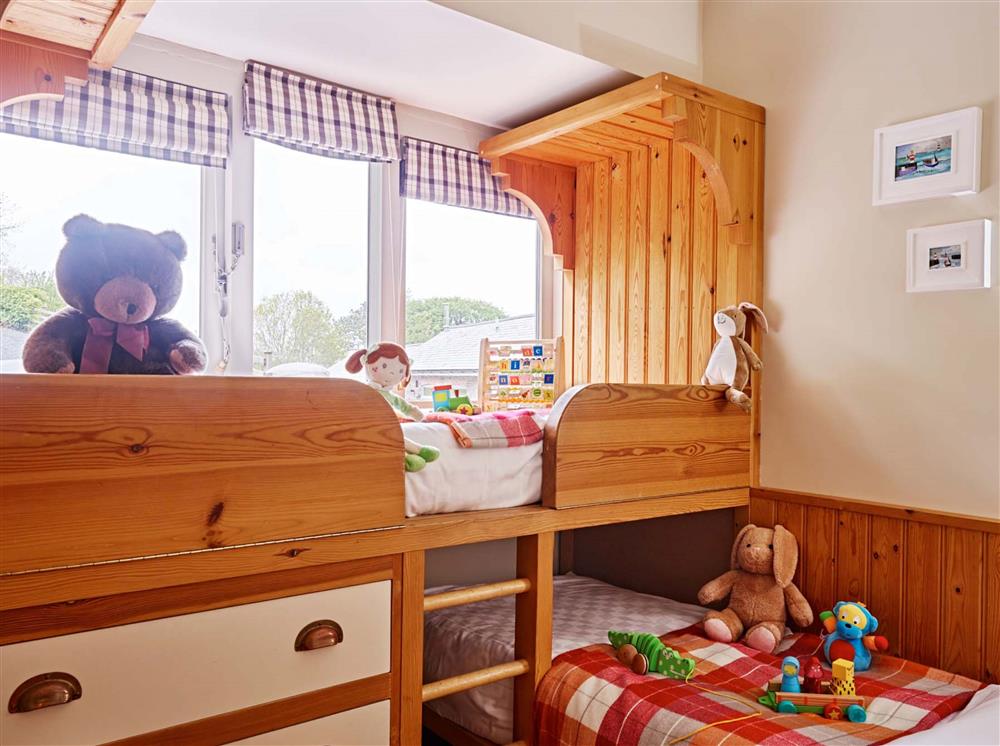 Bedroom four, with compact twin L-shaped cabin beds, suitable for under 12’s at Garden House, Dartmouth
