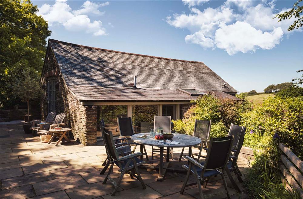 Enjoy alfresco dining in this secluded setting at Garden House, Dartmouth
