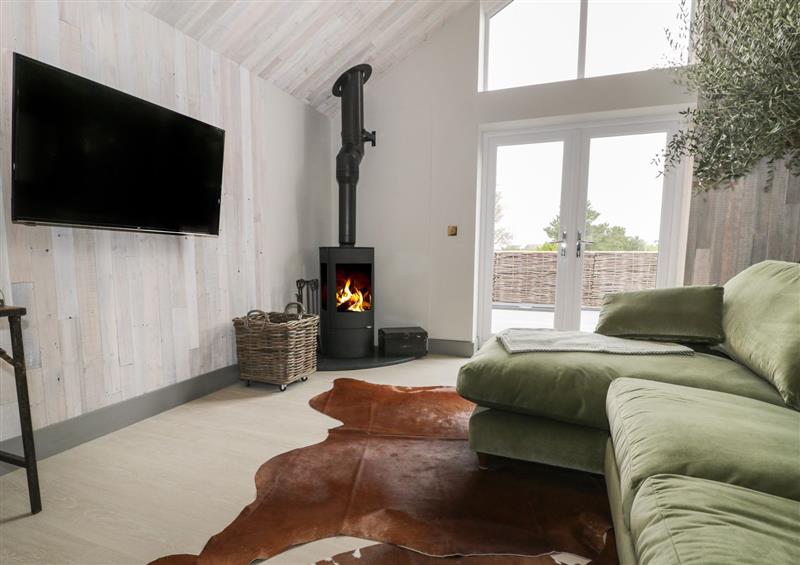 Relax in the living area at Garden House, Llanfechell