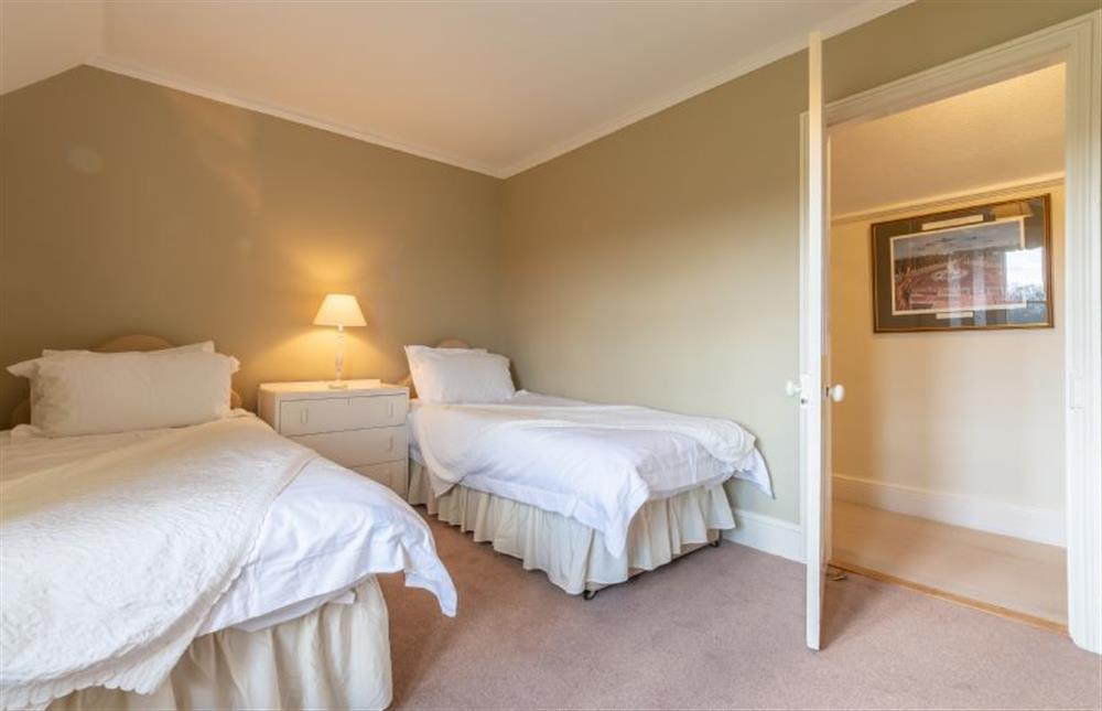First floor: Bedroom four with three foot twin beds at Garden House, Sandringham
