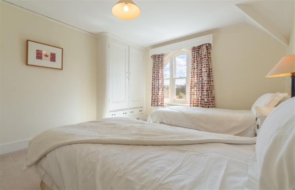 First floor: Bedroom three with three foot twin beds at Garden House, Sandringham