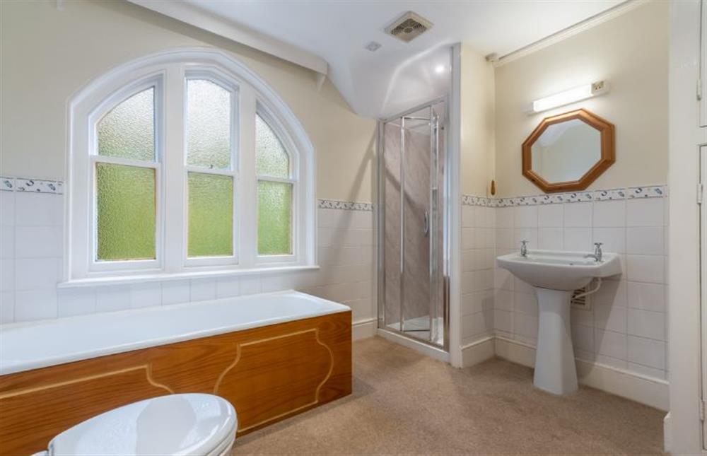 First floor: Family bathroom with separate shower cubicle at Garden House, Sandringham