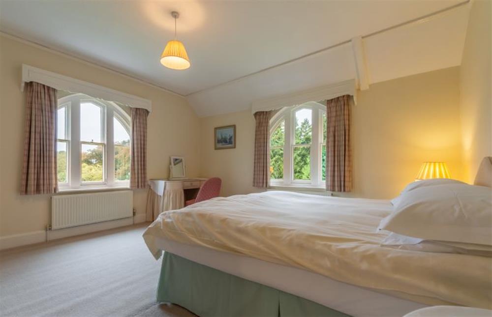 First floor: Master bedroom with zip \u0026 link super-king / twin beds (photo 2) at Garden House, Sandringham