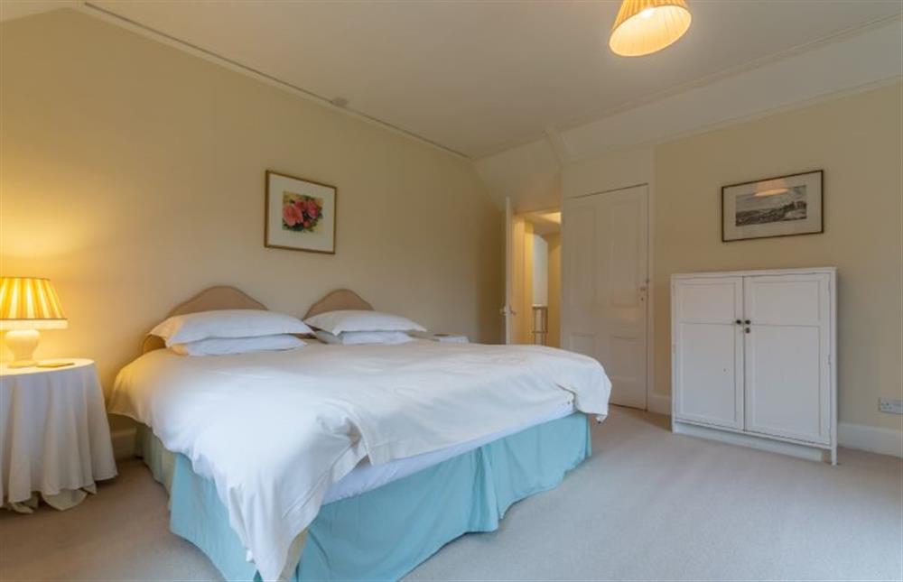 First floor: Master bedroom with zip \u0026 link super-king / twin beds at Garden House, Sandringham