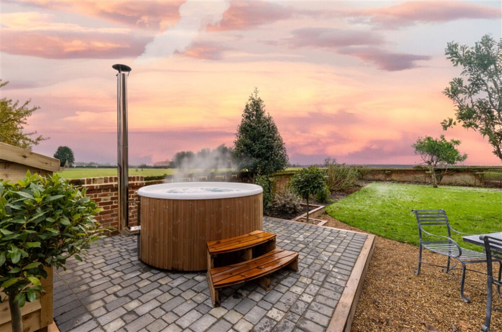 The soothing wood-fired hot tub at Garden House, Wolterton