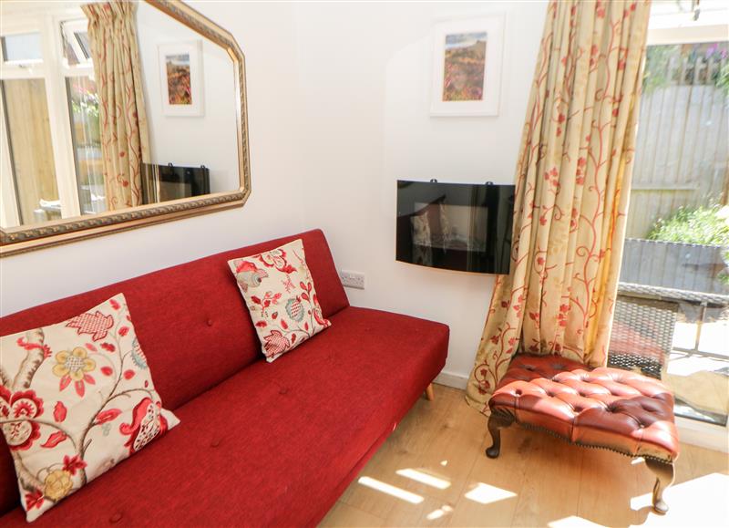 Relax in the living area (photo 2) at Garden Suite, Dronfield