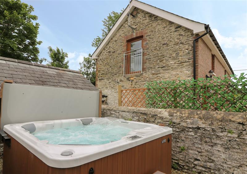 Enjoy the hot tub at Garden View, Llanybydder