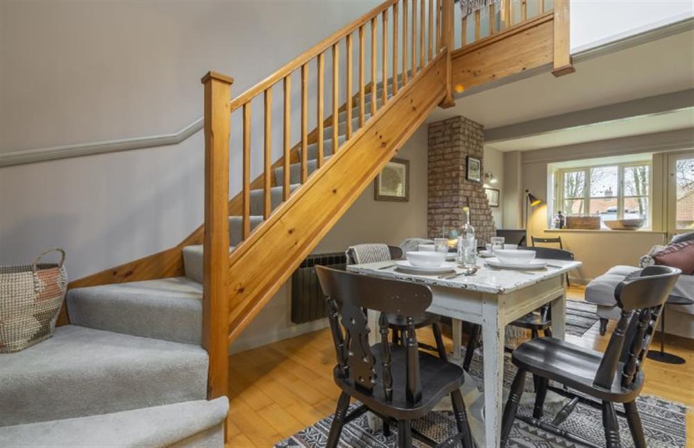 Ground floor: Dining area with stairs   (photo 2) at Garden Wall Cottage, Great Snoring near Fakenham