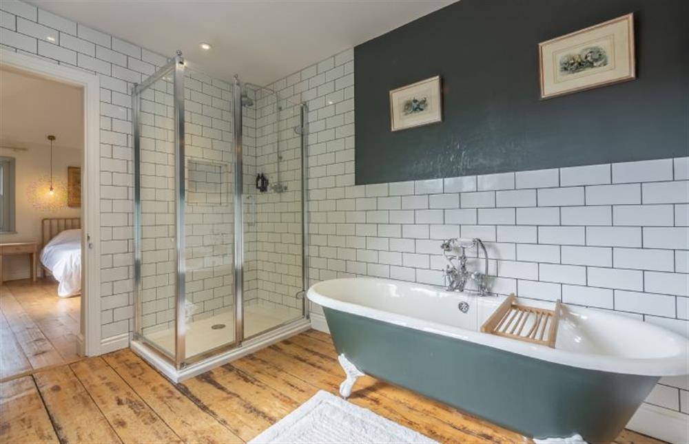 First floor: En-suite bath and shower room with large walk in shower at Gardeners Cottage, Fring near Kings Lynn