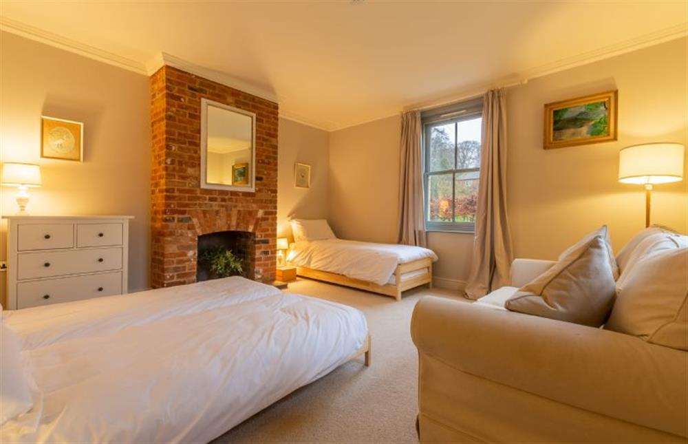 Ground floor: Bedroom three has flexible bed options, sleeping up to four at Gardeners Cottage, Fring near Kings Lynn