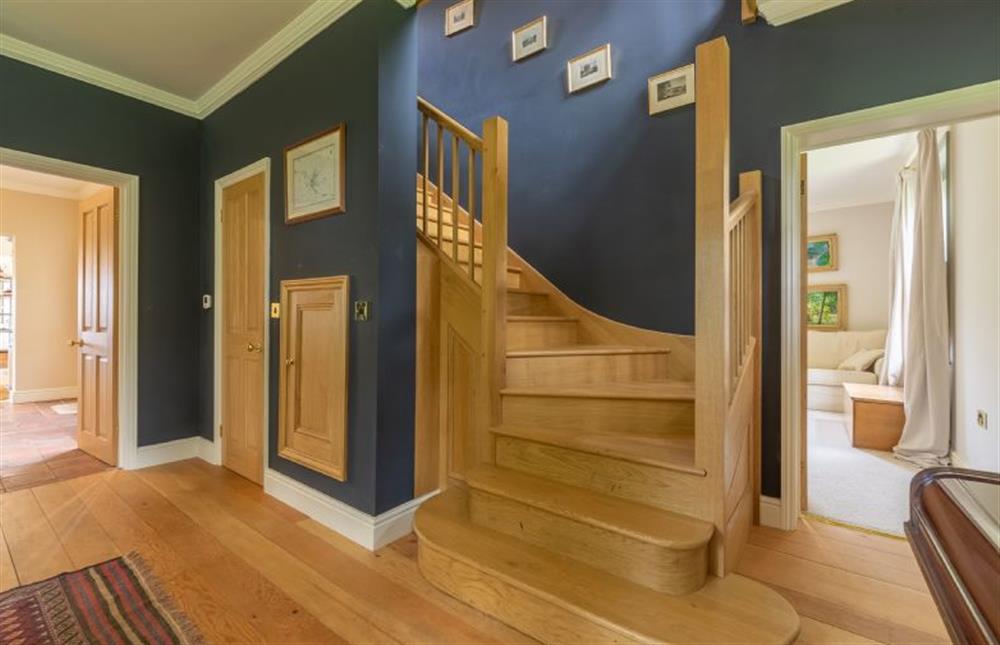 Ground floor: Large staircase leads to first floor at Gardeners Cottage, Fring near Kings Lynn