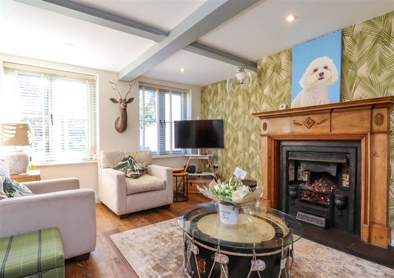Relax in the living area at Gardeners Cottage, Lytham St. Annes