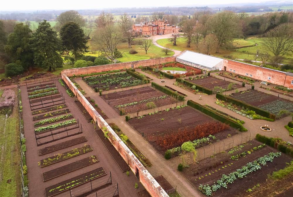 A wonderful aerial view of the walled garden with Netherby Hall in the background at Gardeners Cottage, Netherby Hall, Longtown