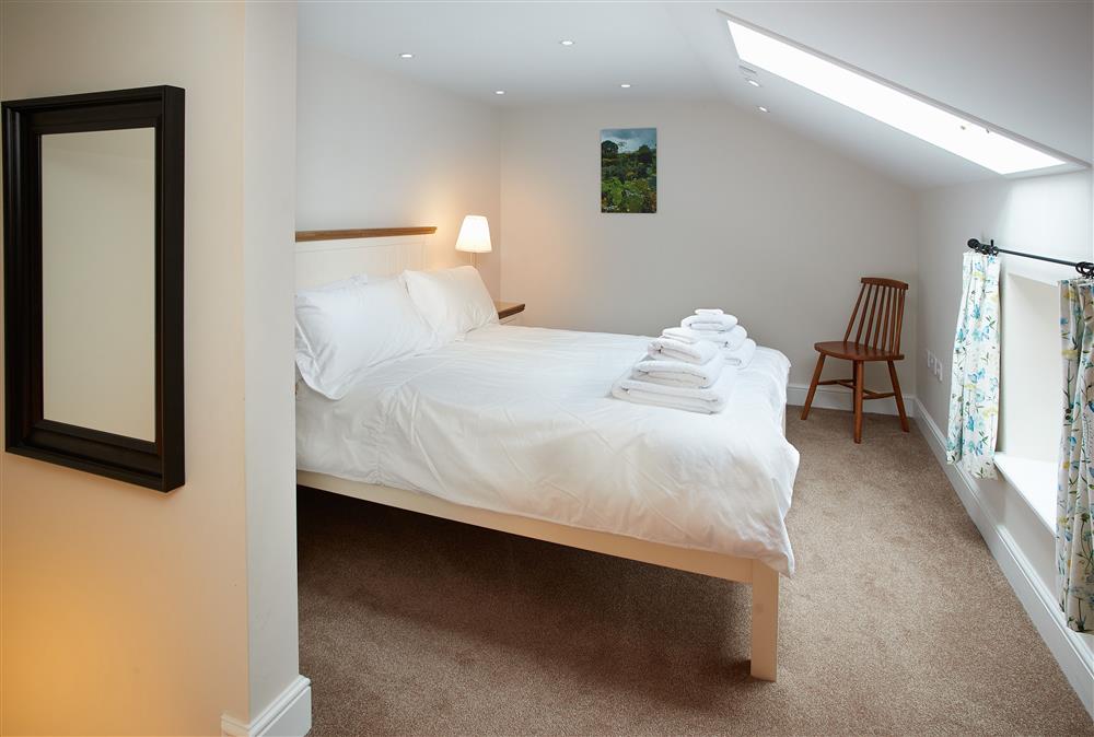 Bedroom with 4’6 double bed (photo 3) at Gardeners Cottage, Netherby Hall, Longtown