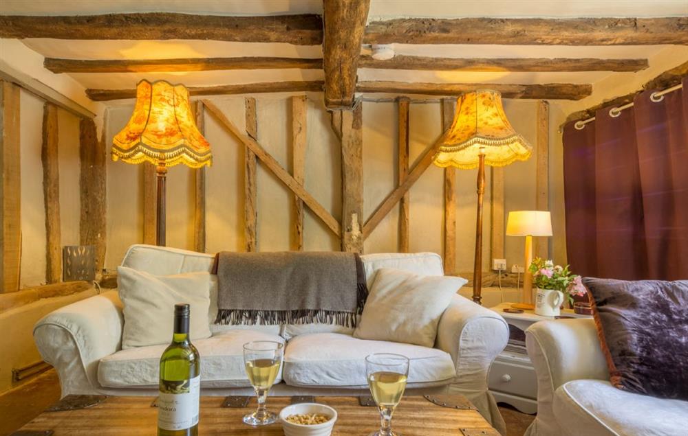 Lovely sitting room with original features including stunning oak exposed beams at Gardeners Cottage (Suffolk), Thornham Magna