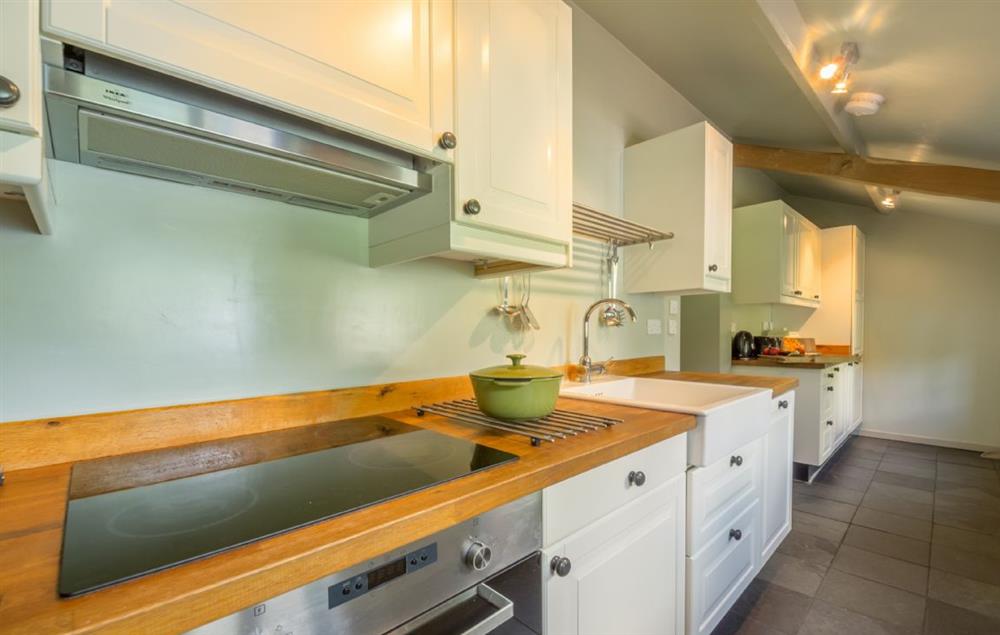 Stylish kitchen with electric oven and hob at Gardeners Cottage (Suffolk), Thornham Magna