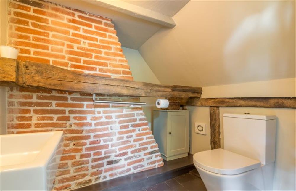 First floor:  En suite cloakroom with wash basin and WC at Gardeners Cottage, Thornham Magna near Eye