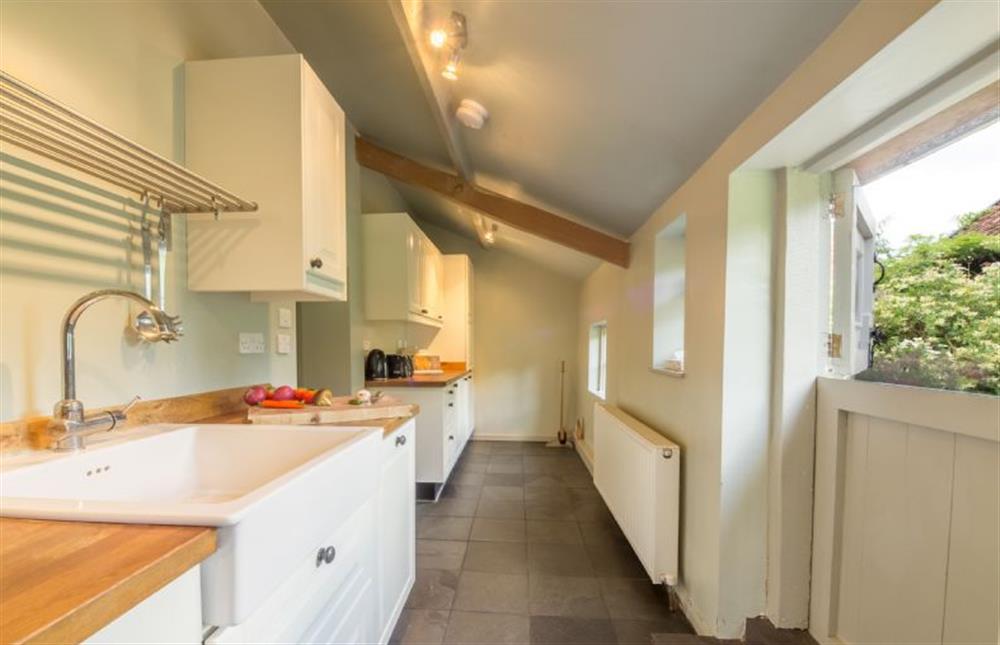 Ground floor: Kitchen with Butlerfts sink at Gardeners Cottage, Thornham Magna near Eye