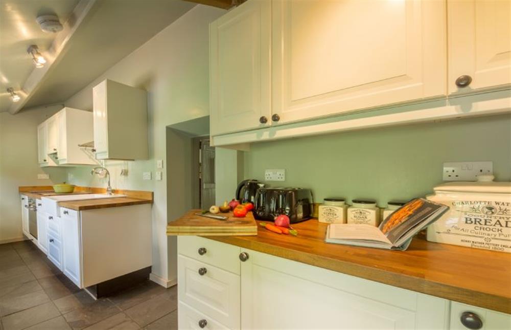 Ground floor: Kitchen with plenty of cupboard space at Gardeners Cottage, Thornham Magna near Eye