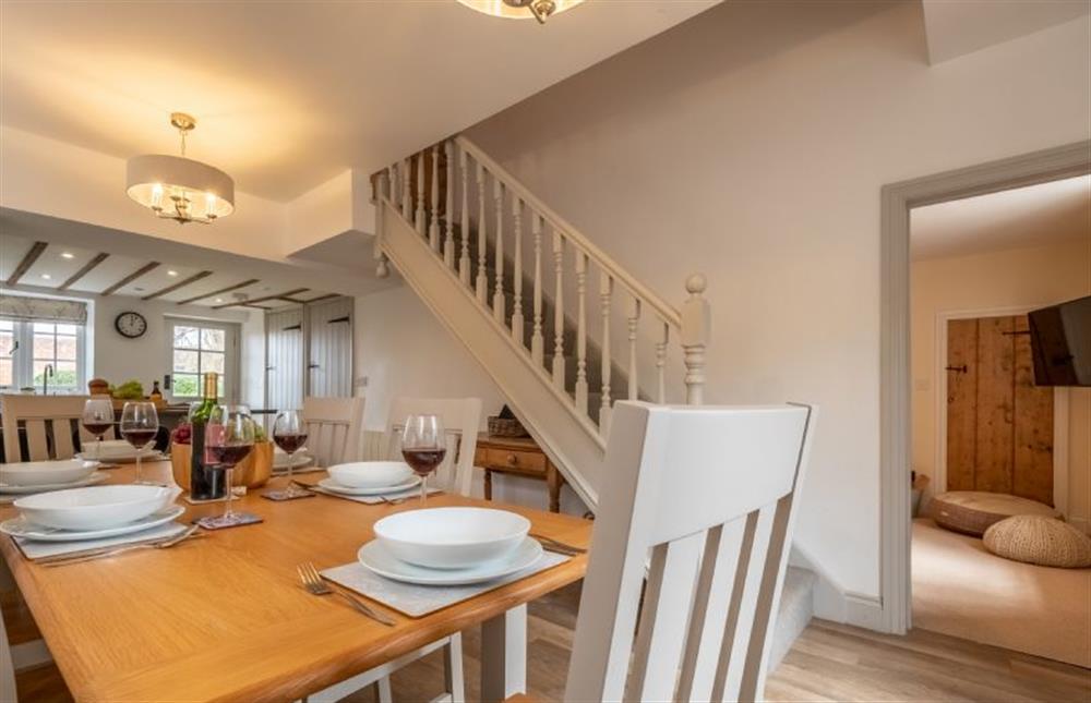 Open plan Dining area with seating for six people (photo 2) at Gardeners Cottage, Thornham near Hunstanton