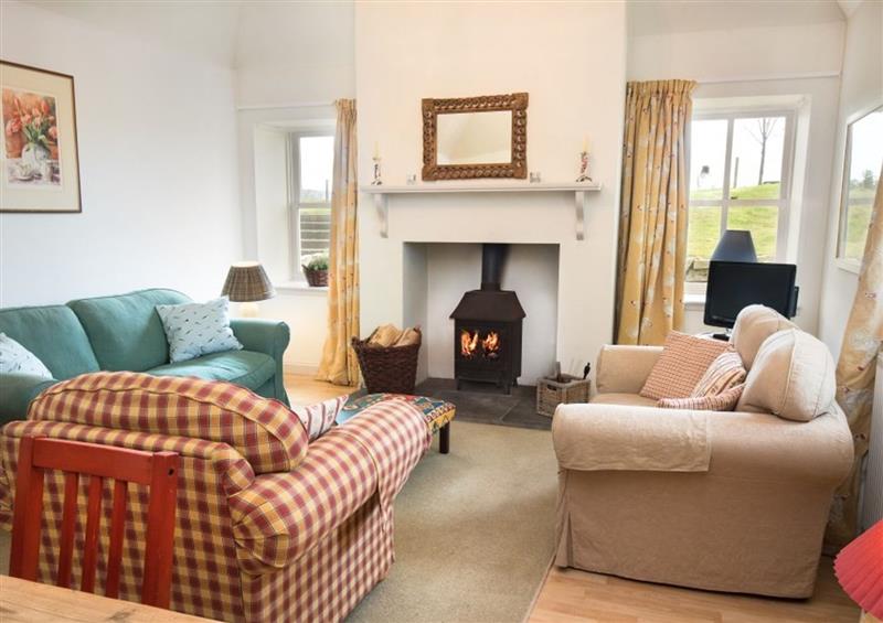 Enjoy the living room at Gardeners Cottage, Urquhart near Elgin