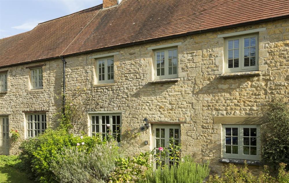 Garsons Cottage is nestled down a quiet country lane in the conservation village of Idbury in the Cotswolds Hills