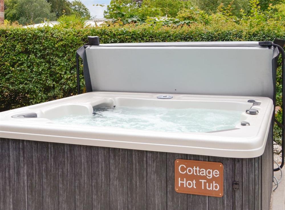 Relaxing hot tub at Garth Cottage, 