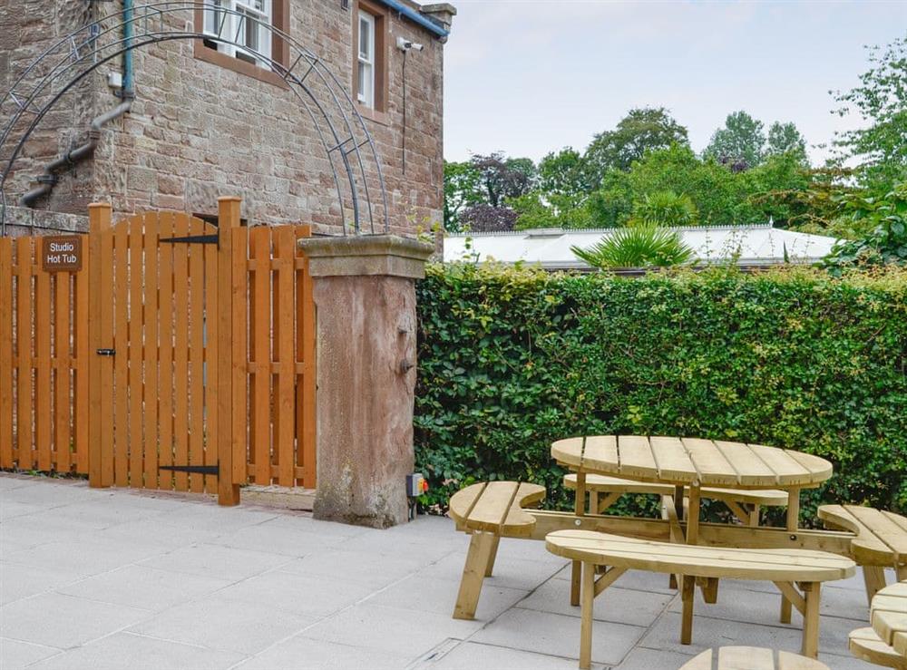 Additional patio area with outdoor furniture at Garth Studio, 